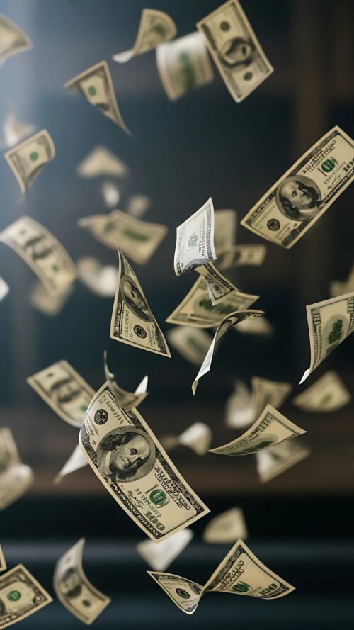 Falling American Dollar Bills on Dark Background Wallpaper